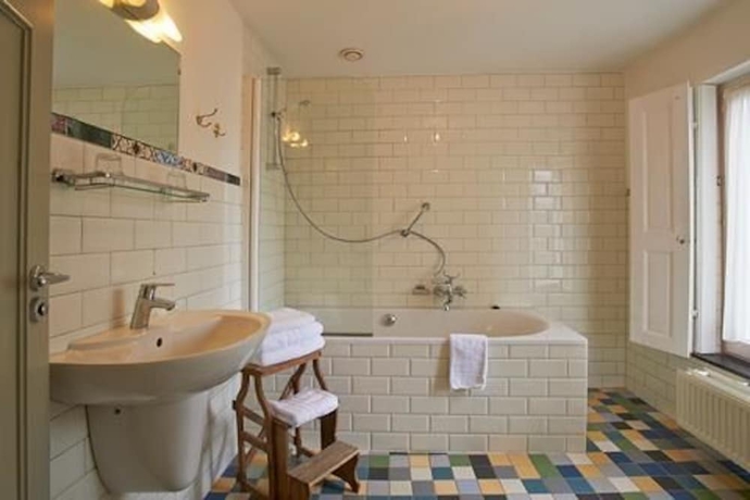 Imagen de la habitación del Hotel Les Charmes. Foto 16