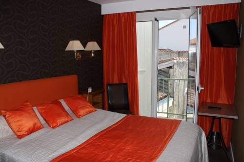 Imagen de la habitación del Hotel Les Colonnes. Foto 3