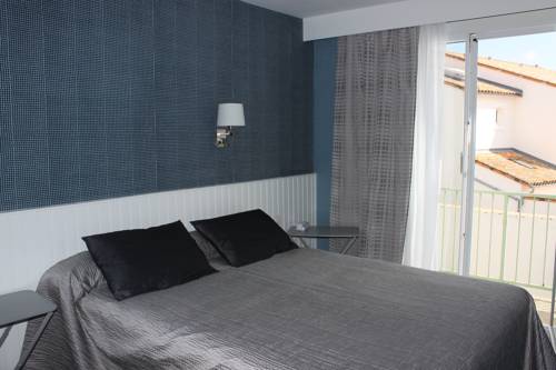 Imagen de la habitación del Hotel Les Colonnes. Foto 4