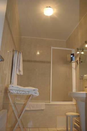 Imagen de la habitación del Hotel Les Colonnes. Foto 6