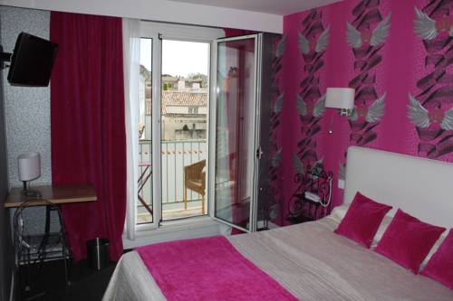 Imagen de la habitación del Hotel Les Colonnes. Foto 11