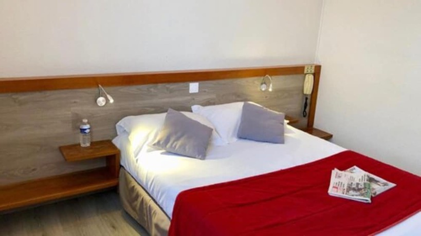 Imagen de la habitación del Hotel Les Cordeliers. Foto 10