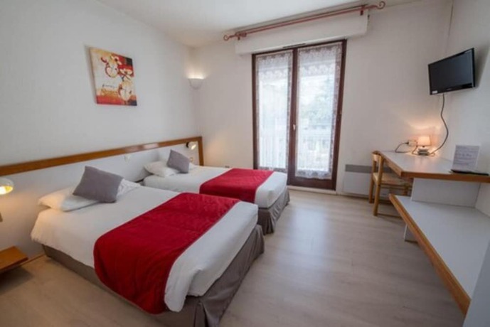 Imagen de la habitación del Hotel Les Cordeliers. Foto 11