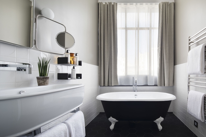 Imagen de la habitación del Hotel Les Deux Girafes. Foto 3