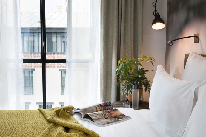 Imagen de la habitación del Hotel Les Deux Girafes. Foto 5