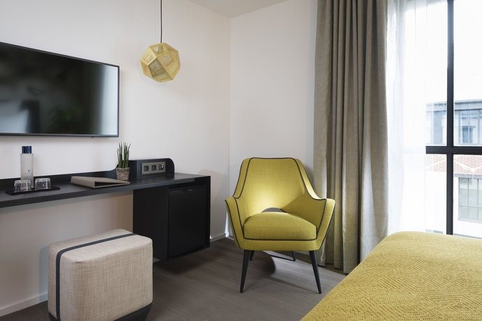 Imagen de la habitación del Hotel Les Deux Girafes. Foto 8