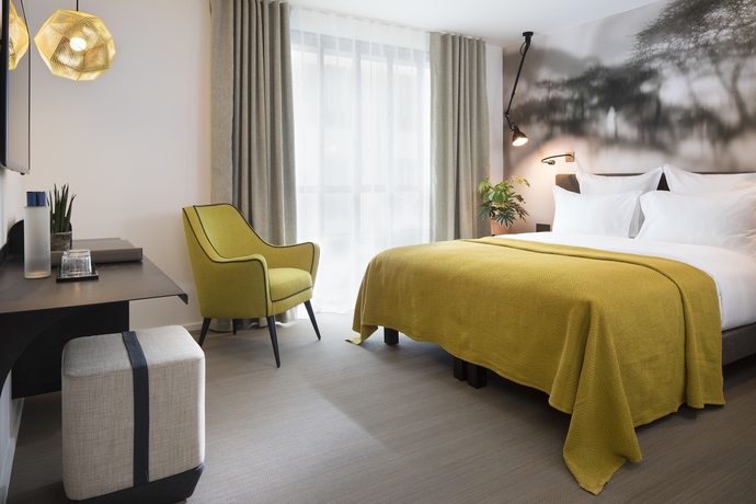 Imagen de la habitación del Hotel Les Deux Girafes. Foto 12