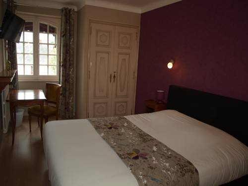 Imagen de la habitación del Hotel Les Deux Magots. Foto 15