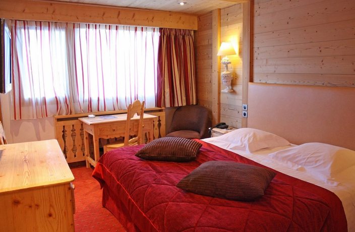Imagen de la habitación del Hotel Les Ducs de Savoie. Foto 9