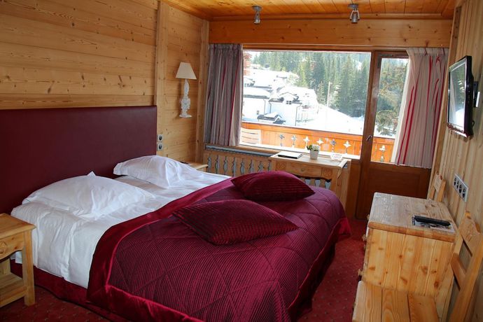 Imagen de la habitación del Hotel Les Ducs de Savoie. Foto 13
