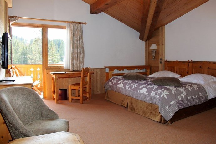 Imagen de la habitación del Hotel Les Ducs de Savoie. Foto 17