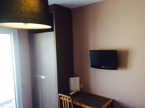 Imagen de la habitación del Hotel Les Dunes. Foto 7