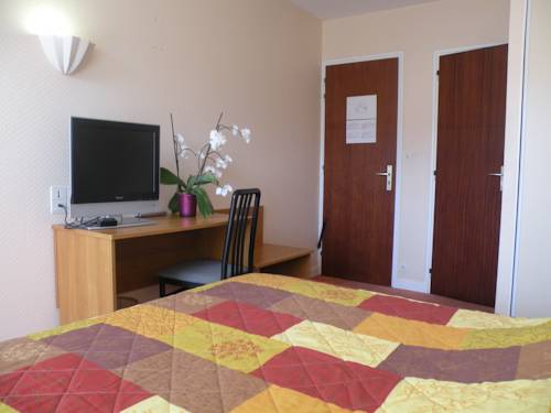 Imagen de la habitación del Hotel Les Dunes. Foto 14