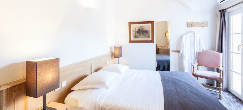Imagen de la habitación del Hotel Les Eleveurs. Foto 7