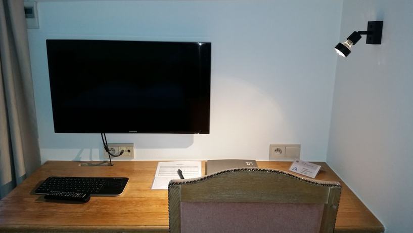 Imagen de la habitación del Hotel Les Eleveurs. Foto 13