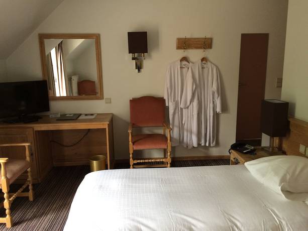 Imagen de la habitación del Hotel Les Eleveurs. Foto 16