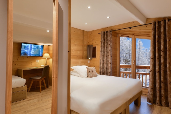 Imagen de la habitación del Hotel Les Escondus. Foto 18