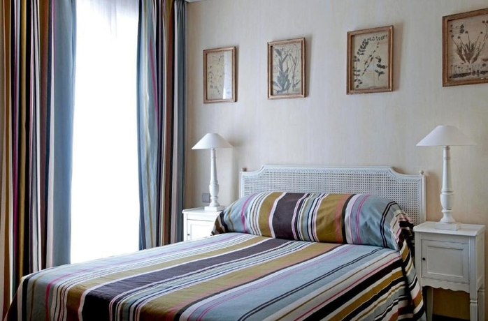 Imagen de la habitación del Hotel Les Etangs De Corot. Foto 11