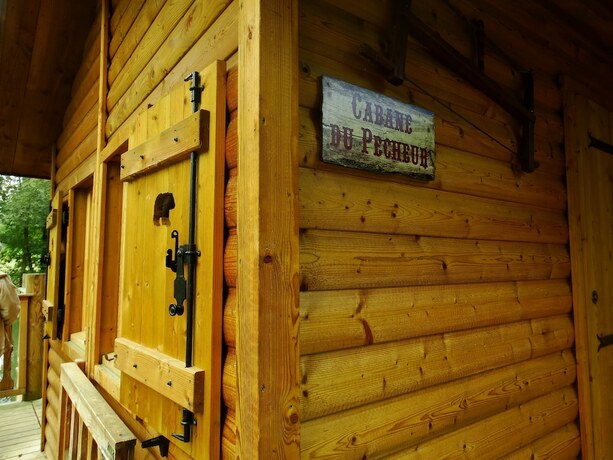 Imagen de la habitación del Hotel Les Etangs du Moulin. Foto 15