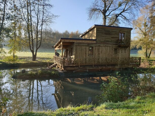 Imagen de la habitación del Hotel Les Etangs du Moulin. Foto 19