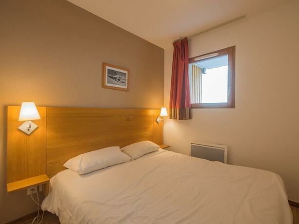 Imagen de la habitación del Hotel Les Etoiles D'orion - Vacancéole. Foto 20