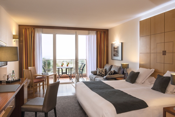 Imagen de la habitación del Hotel Les Flamants Roses. Foto 6