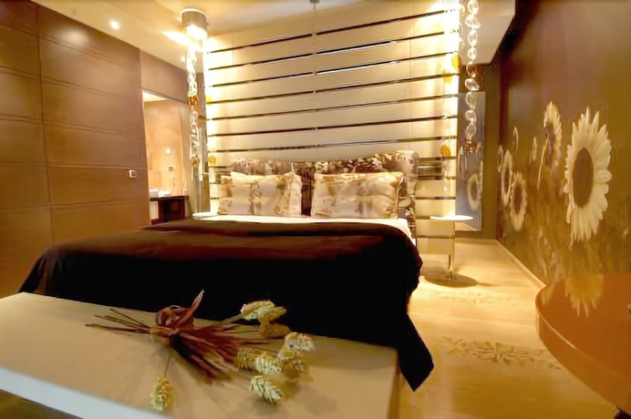 Imagen de la habitación del Hotel Les Fleurs Boutique. Foto 6