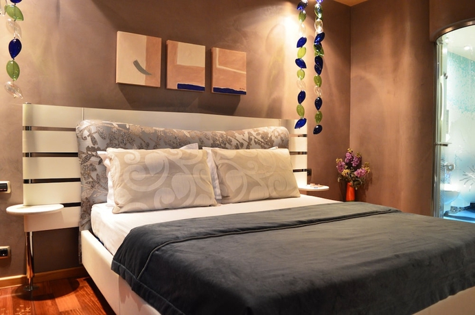 Imagen de la habitación del Hotel Les Fleurs Boutique. Foto 7