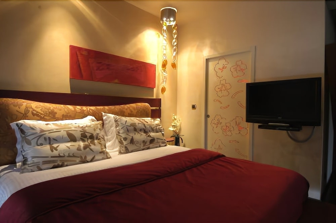 Imagen de la habitación del Hotel Les Fleurs Boutique. Foto 8