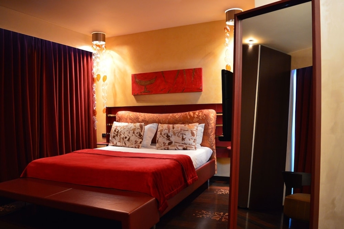 Imagen de la habitación del Hotel Les Fleurs Boutique. Foto 9