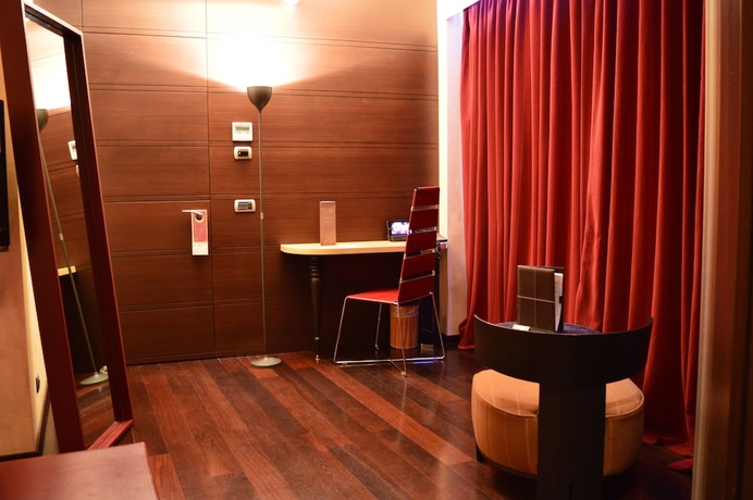 Imagen de la habitación del Hotel Les Fleurs Boutique. Foto 11