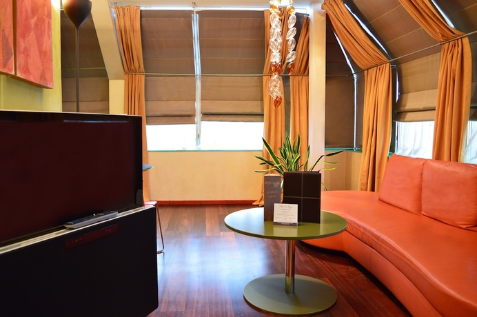 Imagen de la habitación del Hotel Les Fleurs Boutique. Foto 13