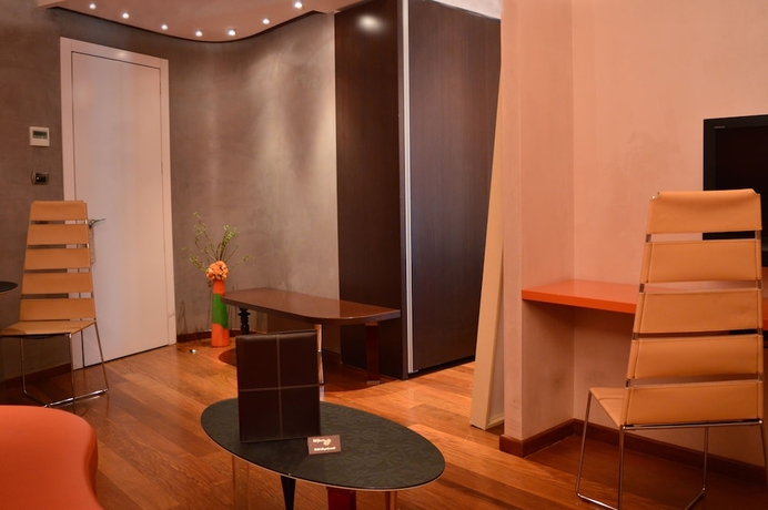 Imagen de la habitación del Hotel Les Fleurs Boutique. Foto 15