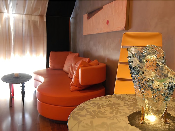 Imagen de la habitación del Hotel Les Fleurs Boutique. Foto 16