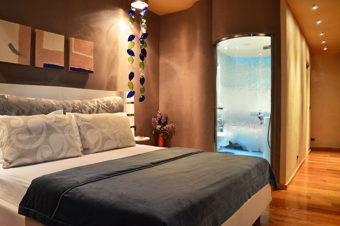 Imagen de la habitación del Hotel Les Fleurs Boutique. Foto 17