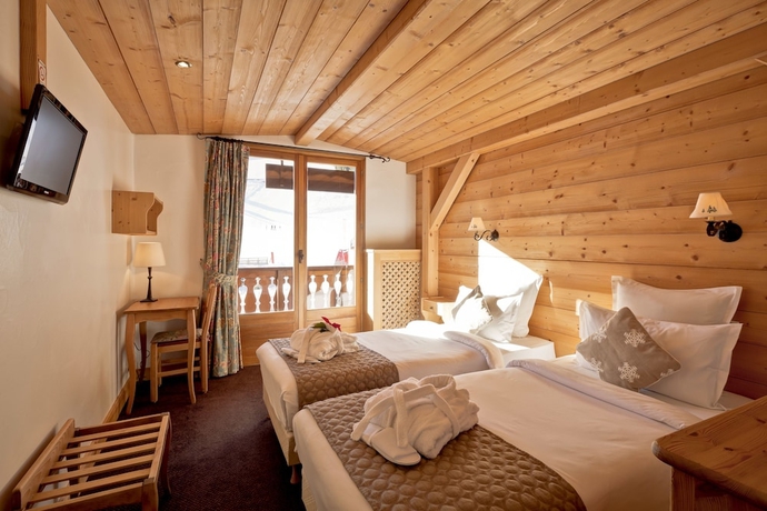 Imagen de la habitación del Hotel Les Flocons. Foto 8