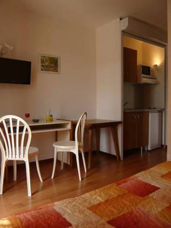 Imagen de la habitación del Hotel Les Gabarres. Foto 9