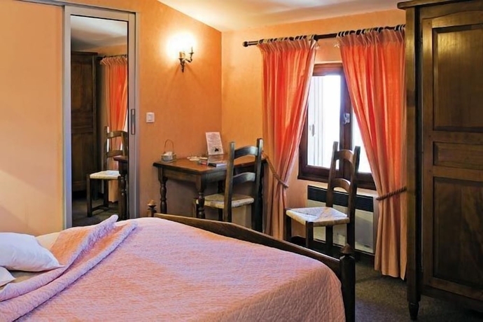 Imagen de la habitación del Hotel Les G&eacute;raniums. Foto 12
