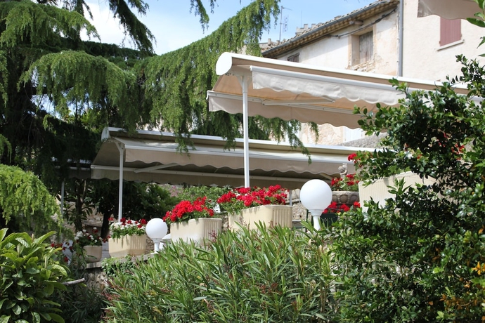 Imagen de la habitación del Hotel Les G&eacute;raniums. Foto 13
