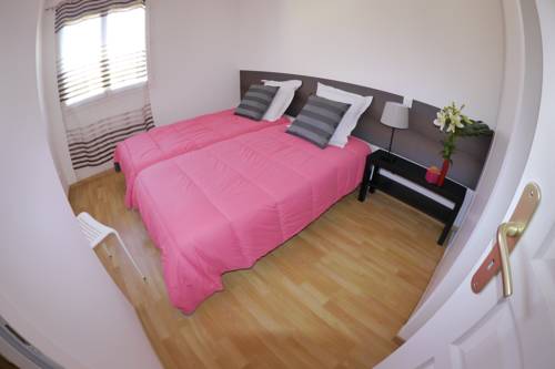 Imagen de la habitación del Hotel Les Grands Vignobles. Foto 6