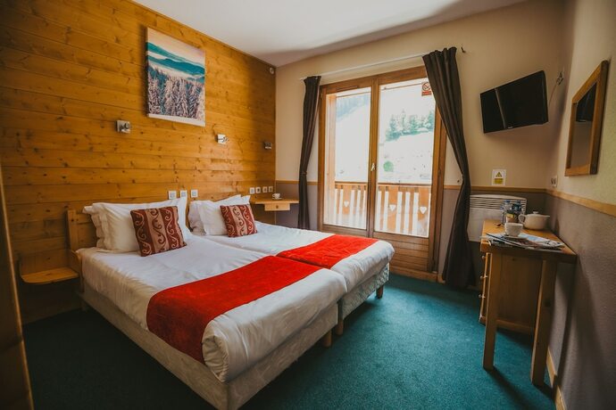 Imagen de la habitación del Hotel Les Grangettes. Foto 15