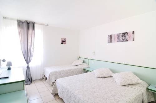 Imagen de la habitación del Hotel Les Grenadines. Foto 14