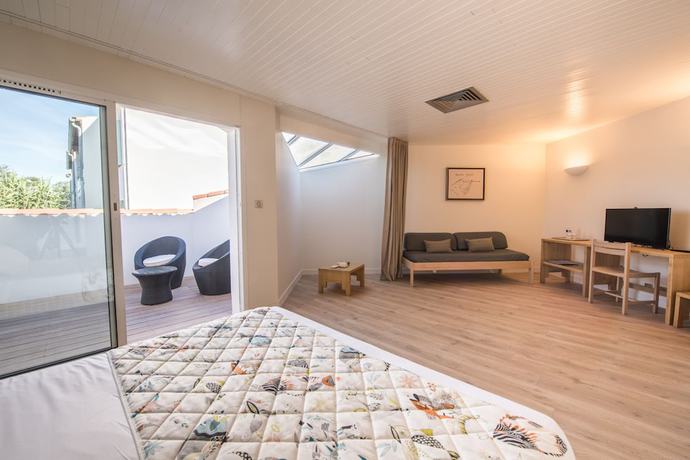 Imagen de la habitación del Hotel Les Grenettes. Foto 10