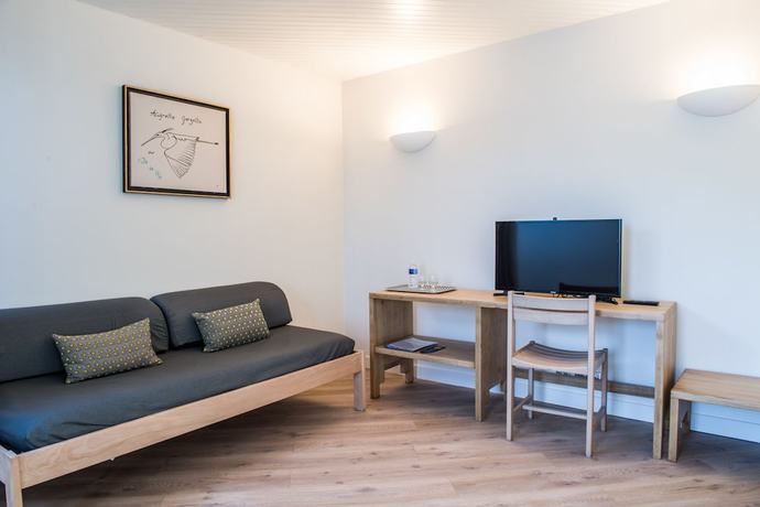 Imagen de la habitación del Hotel Les Grenettes. Foto 14