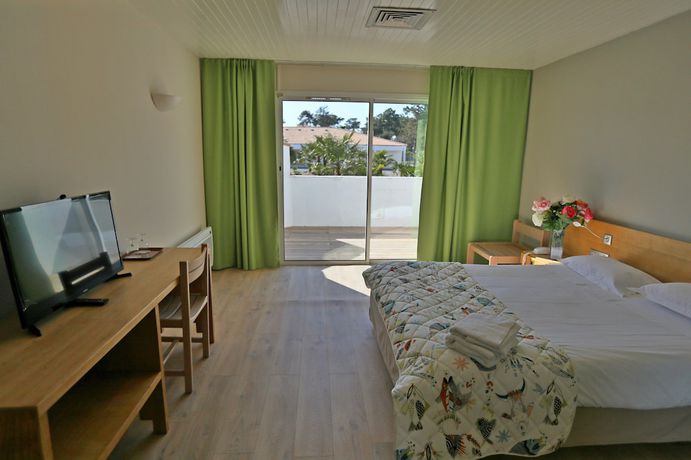 Imagen de la habitación del Hotel Les Grenettes. Foto 15