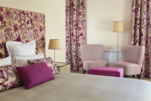 Imagen de la habitación del Hotel Les Herbes Folles. Foto 11