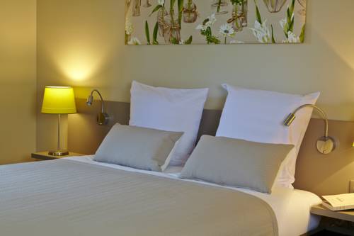 Imagen de la habitación del Hotel Les Herbes Folles. Foto 14