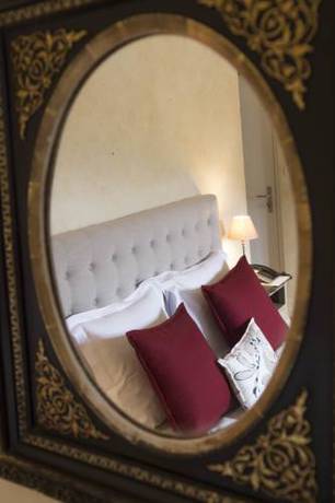 Imagen de la habitación del Hotel Les Hospitaliers. Foto 9