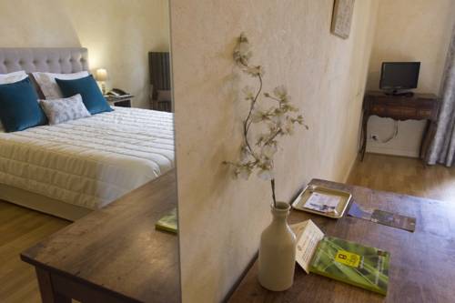 Imagen de la habitación del Hotel Les Hospitaliers. Foto 10