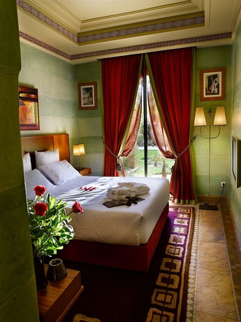 Imagen de la habitación del Hotel Les Jardins D Ines. Foto 7